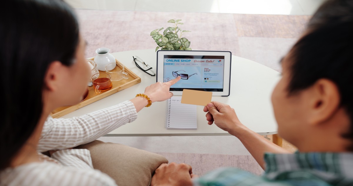 couple-shopping-online-using-tablet-and-credit-car-2026-09-21-15-23-59-utc (1)