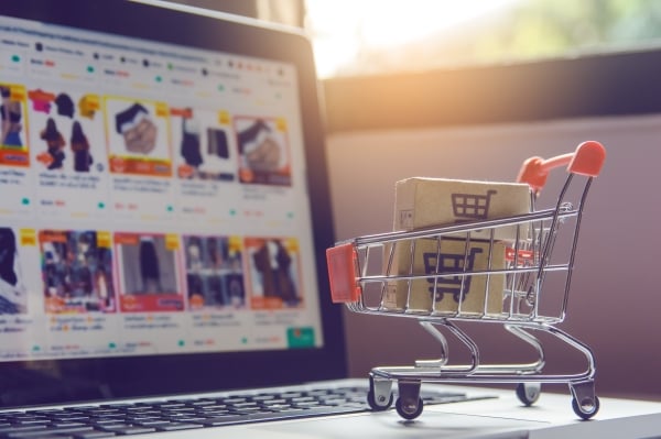 parcel-paper-cartons-with-shopping-cart-logo-trolley-laptop-keyboard